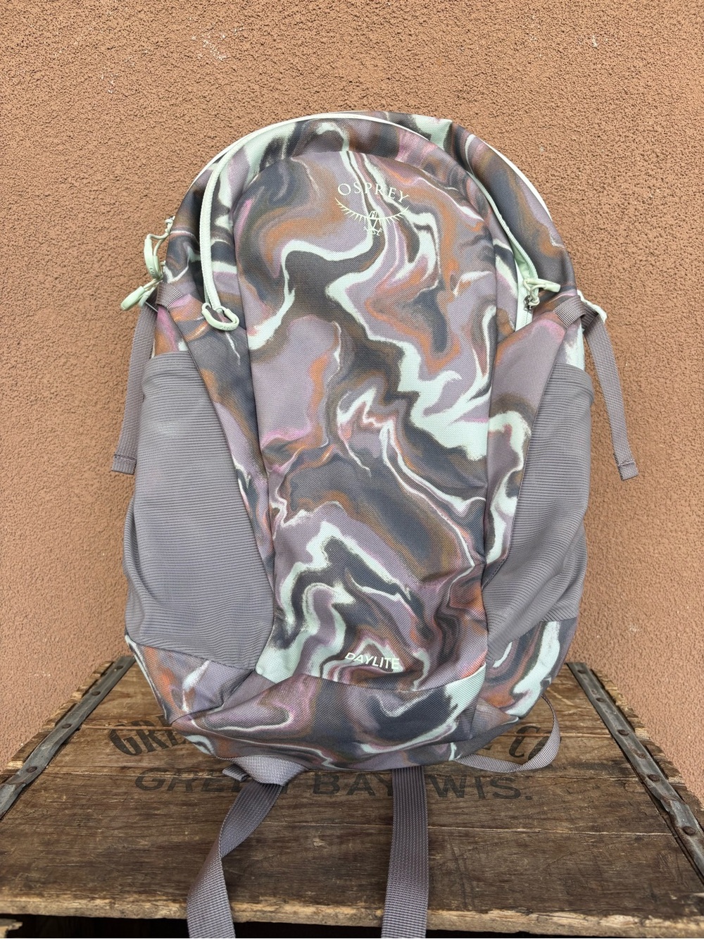 Osprey Daylite Backpack in Swirled Marbled Pattern.